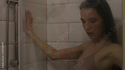 Sensual naked woman in shower