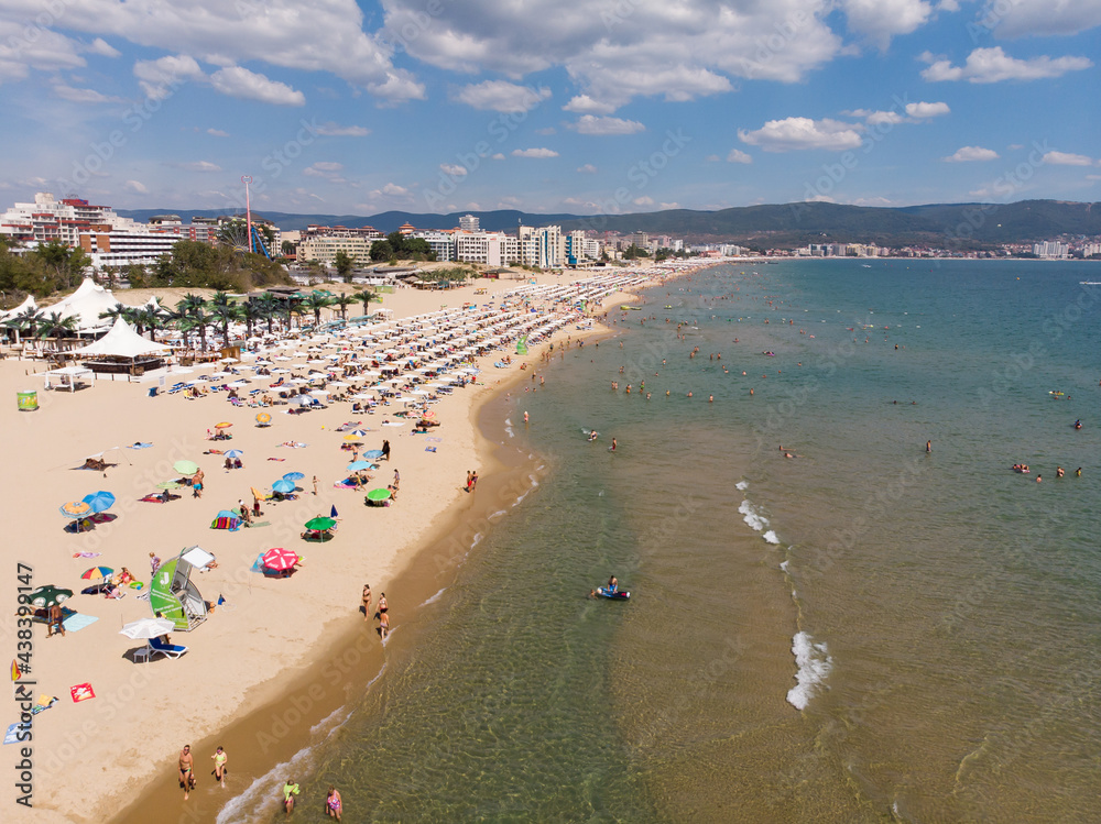 Aerial view of the sand beach of Sunny Beach in Bulgaria. Summer holidays in Europe during quarantine. Aerial photography, drone view.