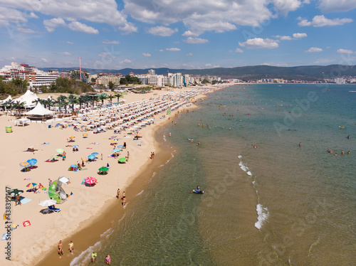 Aerial view of the sand beach of Sunny Beach in Bulgaria. Summer holidays in Europe during quarantine. Aerial photography, drone view. © Marharyta