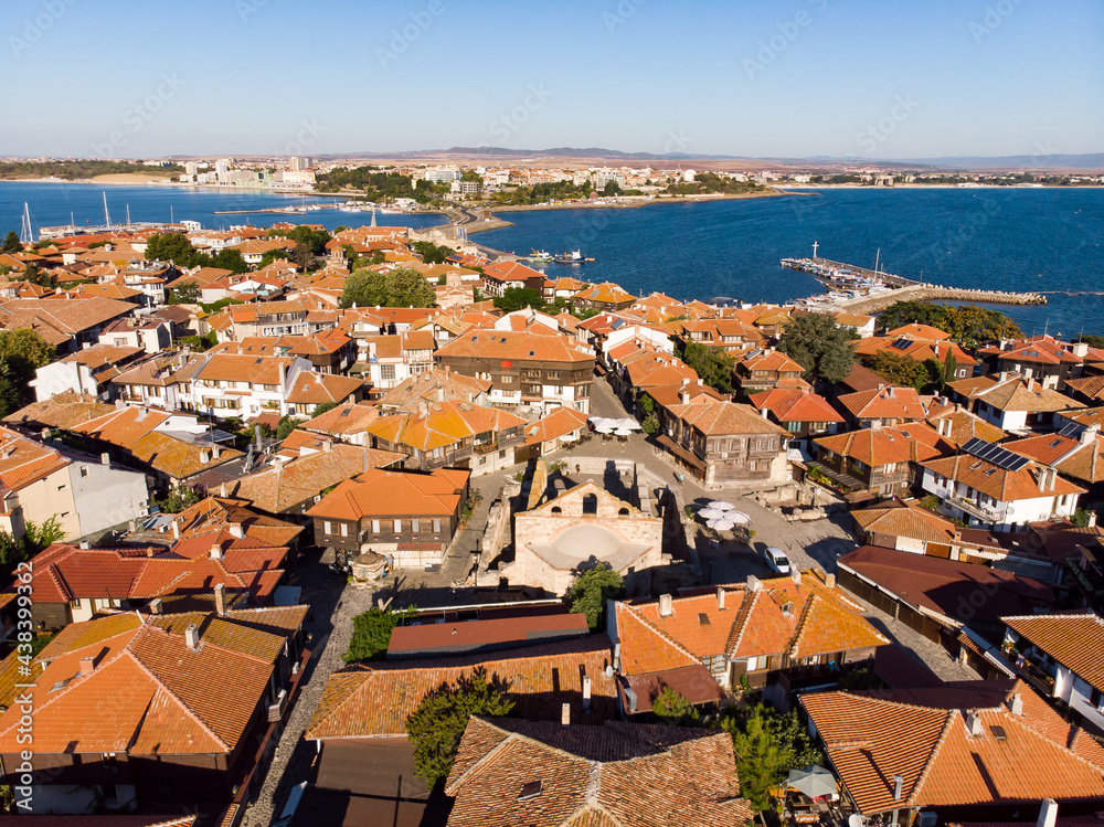 Fototapeta premium Aerial view of the center of old Nessebar, houses, churches. Drone view from above. Summer holidays destination