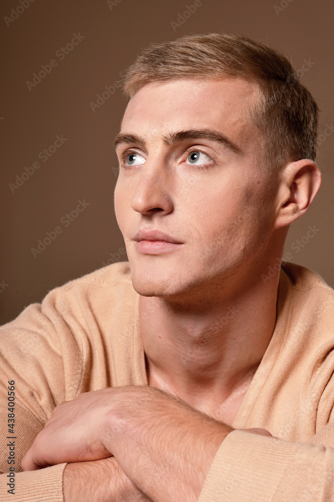 Obraz premium Portrait of handsome young man posing in studio