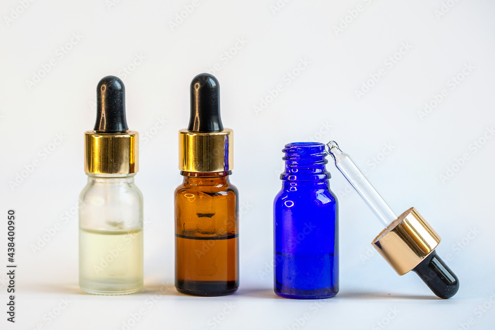A bottle with a pipette for essential oils A bottle with a pipette for essential oils