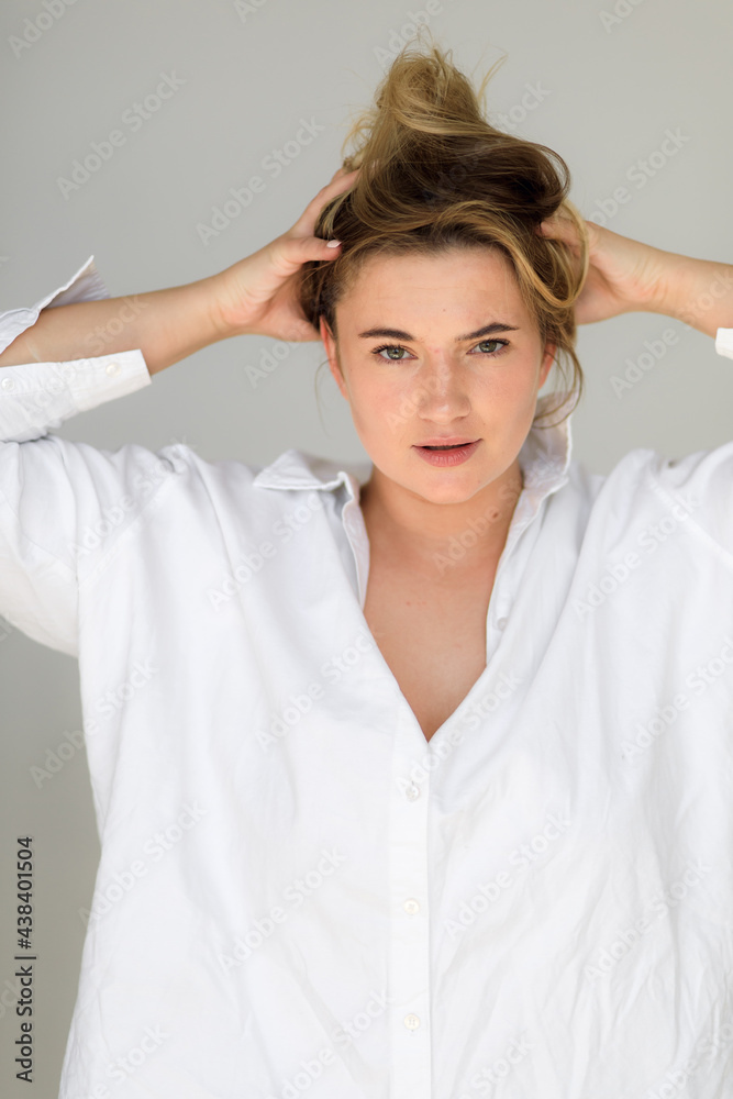 attractive chubby girl posing in white shirt. body positive concept attractive chubby girl posing in white shirt. body positive concept