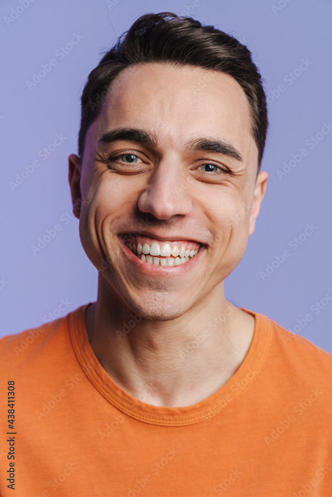 Young brunette white man smiling and looking at camera Young brunette white man smiling and looking at camera