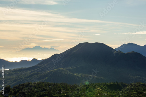 Three Balinese volcanoes at dawn