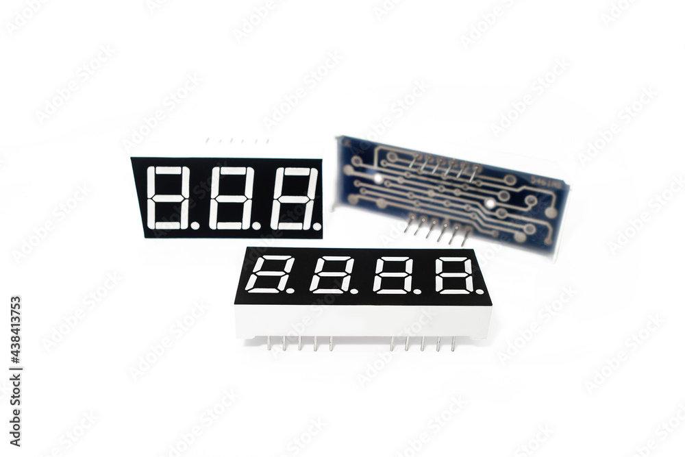 Digital LED indicators laid out by different sides. White background Digital LED indicators laid out by different sides. White background