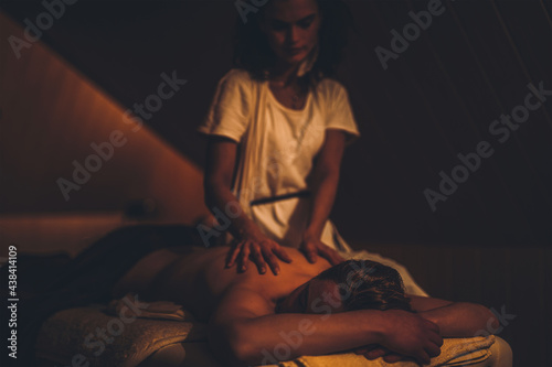massage of a beautiful woman  body care.