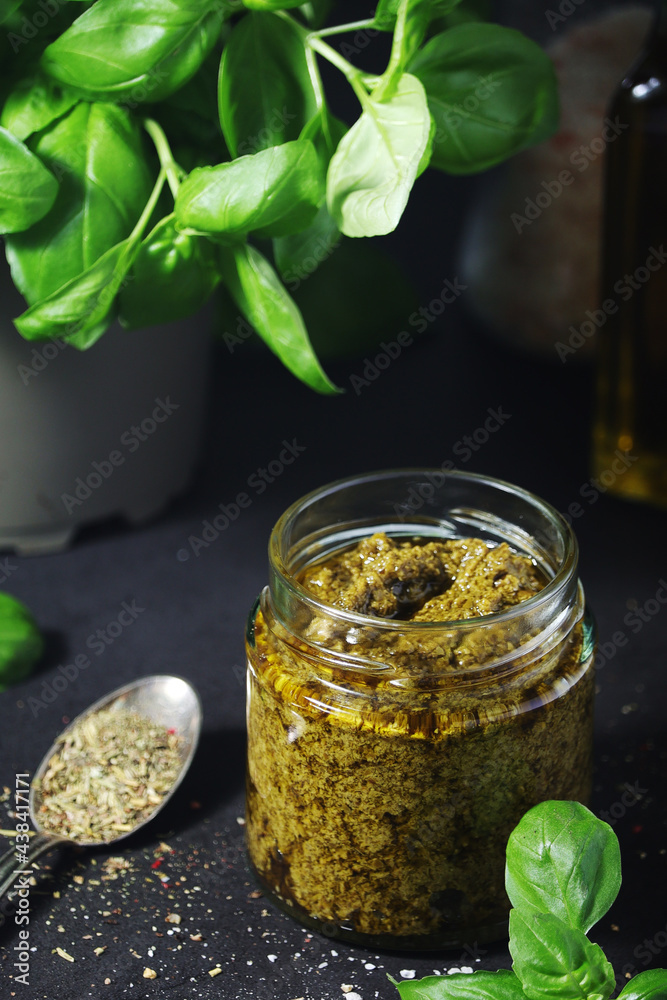 Homemade pesto in a glass jar