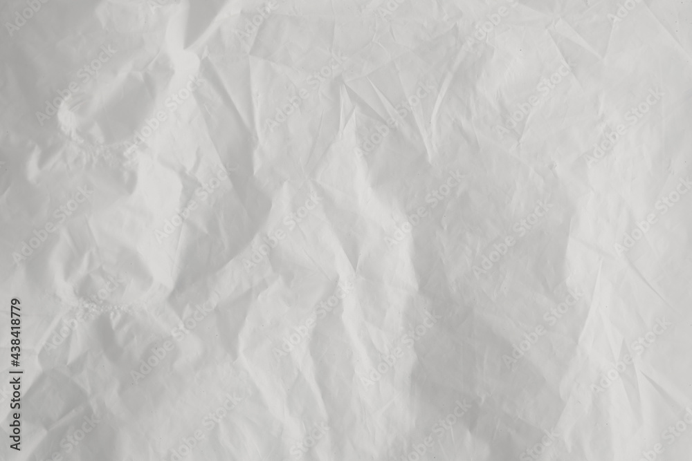 Obraz premium White feathers on a white background