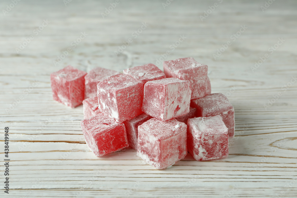 Delicious turkish delight cubes on wooden background Delicious turkish delight cubes on wooden background