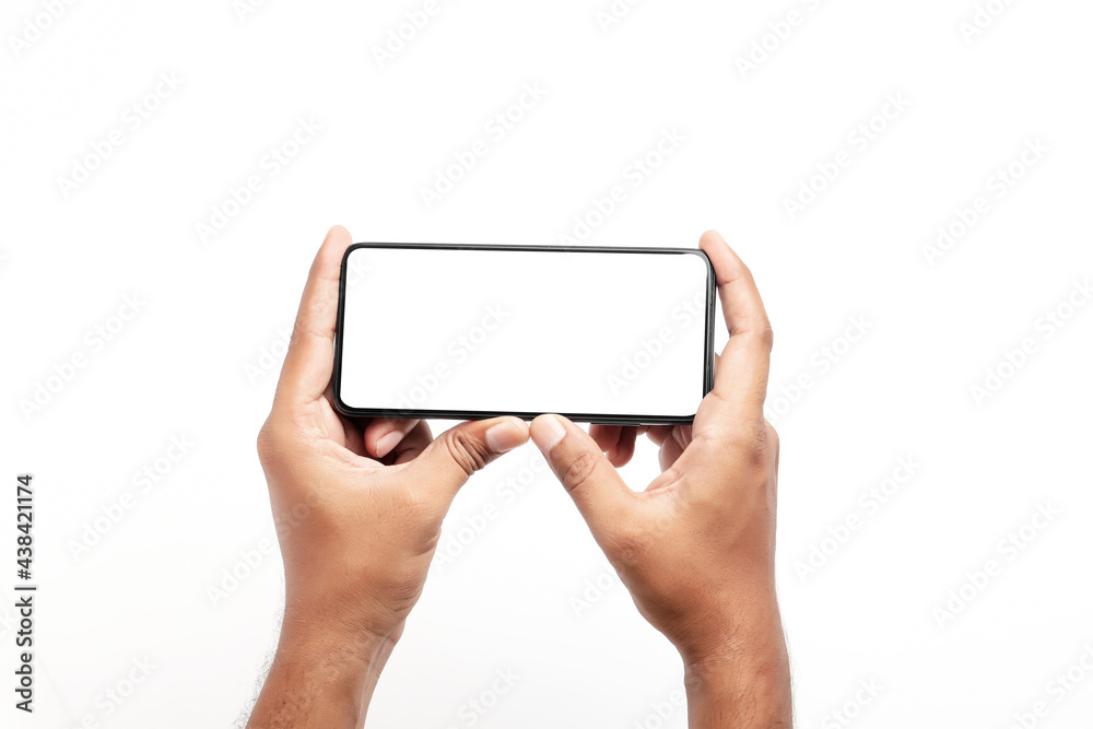 Hand holding a smartphone on a white background. Hand holding a smartphone on a white background.
