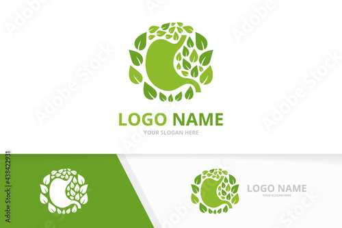 Green gastrointestinal tract logotype template. Natural stomach and leaves design logo.