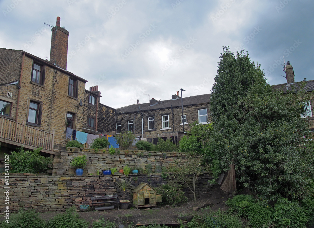 row of old houses next to the rochdale canal in mytholmroyd west yorkshire