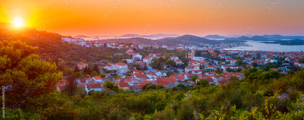Amazing panoramic view of Murter-Kornati town, sea and Kornati islands, scenic landscape in sunset light, Murter otok, Dalmatia, Croatia. Outdoor travel background