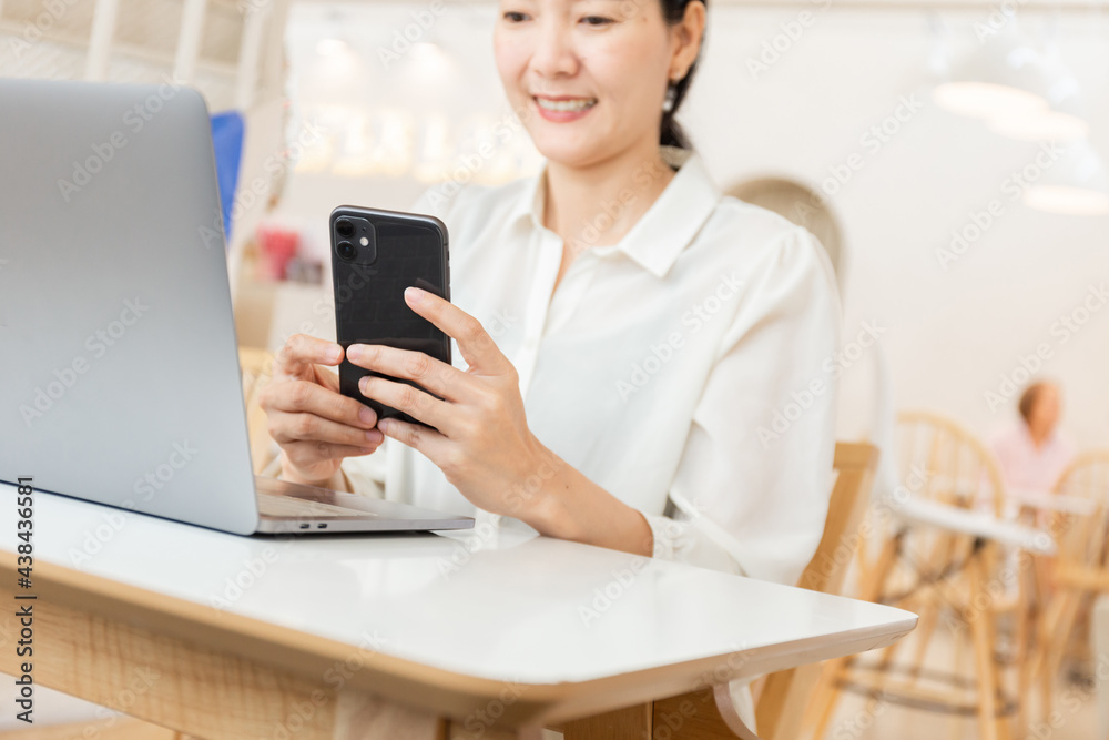 woman work using texting cell phone typing computer.student study education online learning.adult professional chatting on laptop,mobile contact us at Thinking business plan.connecting people concept woman work using texting cell phone typing computer.student study education online learning.adult professional chatting on laptop,mobile contact us at Thinking business plan.connecting people concept