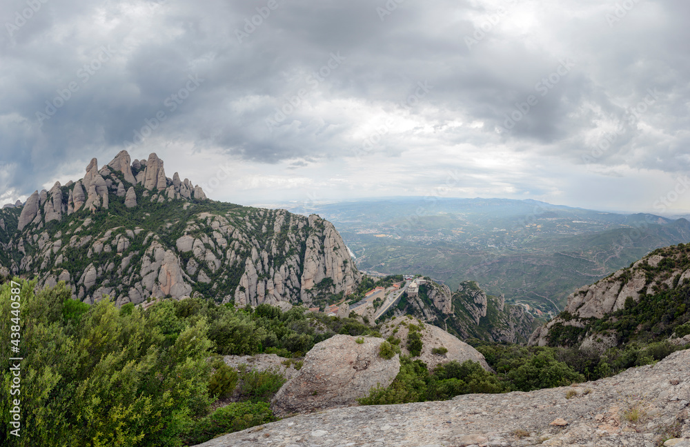 View towards Montserrat Abbey and valley bellow it, Barcelona, Spain.