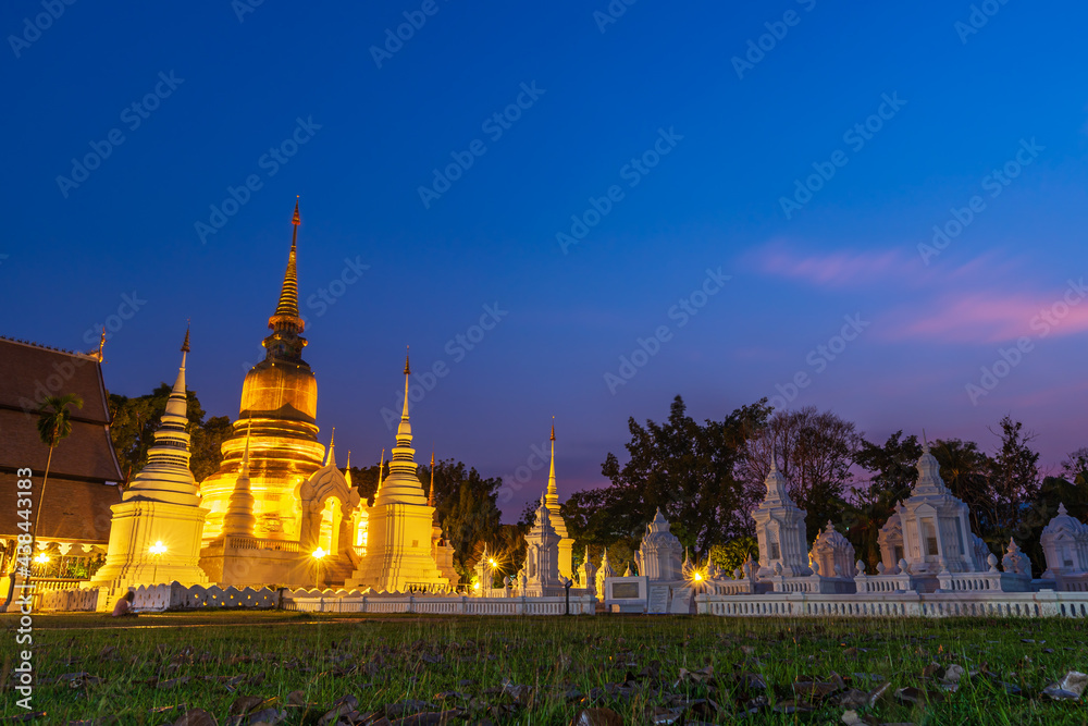 Naklejka premium Wat Suan Dok is a Buddhist temple (Wat) at twilight sunset sky background is a major tourist attraction in Chiang Mai Northern Thailand.Travels in Southeast Asia.