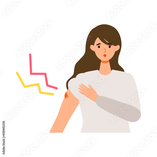 Woman with arm  pain  after getting her COVID-19 vaccine. Concept for coronavirus vaccination.