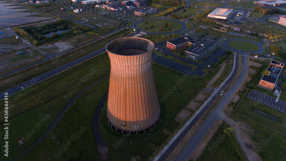 Old metal factory chimney in Caen, Colombelles, Normandy, drone photo at sunset, industrial area Old metal factory chimney in Caen, Colombelles, Normandy, drone photo at sunset, industrial area