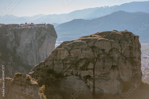 Fototapeta Naklejka Na Ścianę i Meble -  Mysterious rocks of Meteora, Greece is one of the gems of Greece. Rock pinnacles topped with a total of 24 monasteries in the rays of sunset light