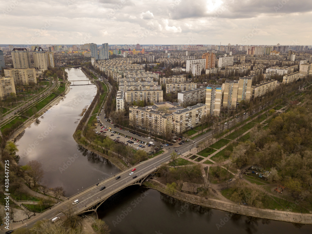 Residential area of Kiev near the river. Aerial drone view.