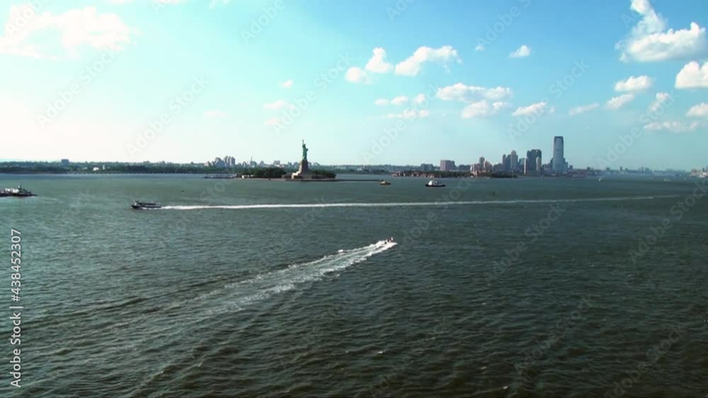 View of Statue of Liberty at New York City over Hudson River View of Statue of Liberty at New York City over Hudson River