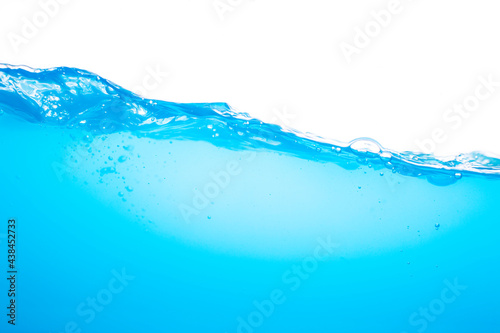 Water surface wave colour blue with bubbles isolated on the white background. © chitsanupong