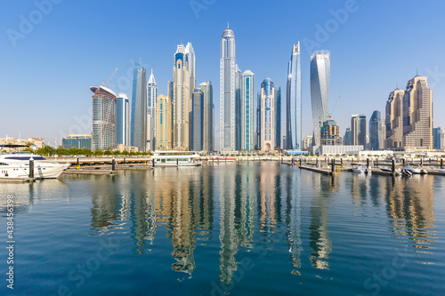 Dubai Marina and Harbour skyline architecture travel in United Arab Emirates water reflection