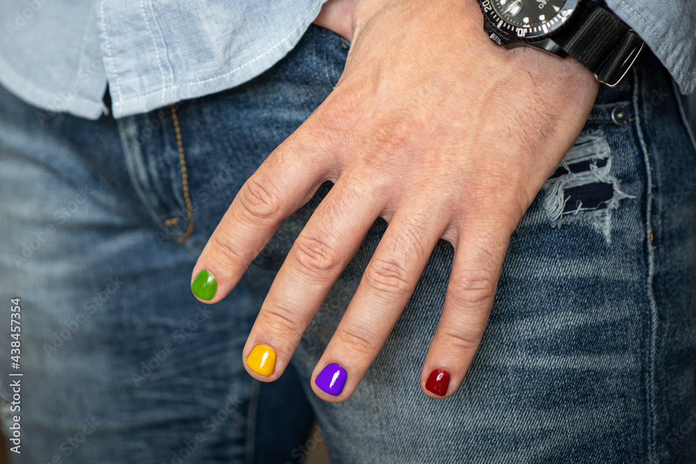 Demonstration of a beautiful nail design. A man with painted nails. Design  of male nails. men manicure. Stock Photo | Adobe Stock
