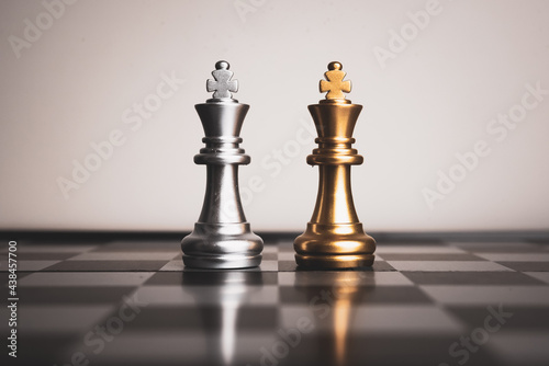 Closeup of chess characters on board games. to represent decision making in term of business strategy to find out the best solution to meet target objective and goal. 