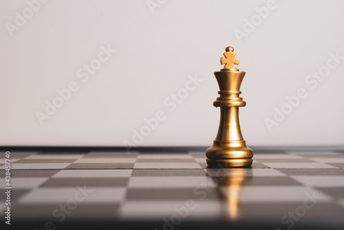 Closeup of chess characters on board games. to represent decision making in term of business strategy to find out the best solution to meet target objective and goal. 