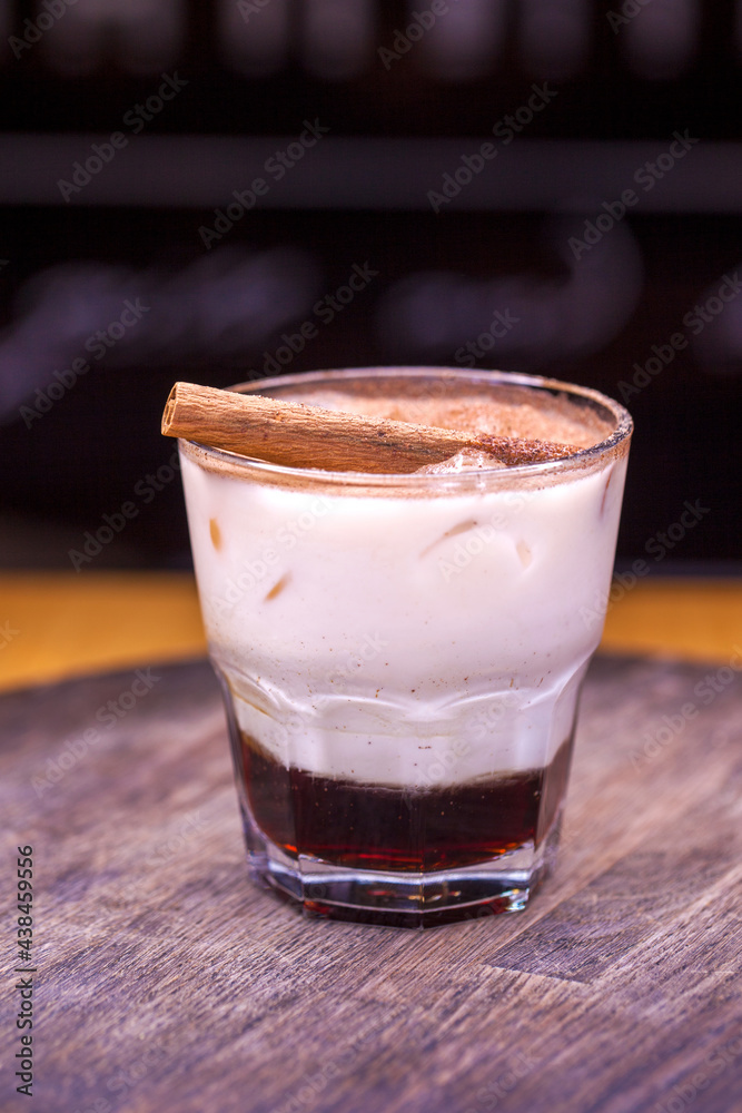Alcoholic cocktail on wooden board Alcoholic cocktail on wooden board