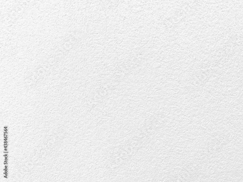 Seamless texture of white cement wall a rough surface, with space for text, for a background.