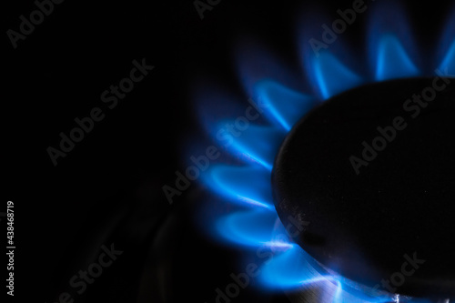 Close up of a natural gas flame on cooker hob with copy space 