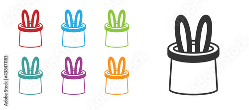 Black Magician hat and rabbit ears icon isolated on white background. Magic trick. Mystery entertainment concept. Set icons colorful. Vector