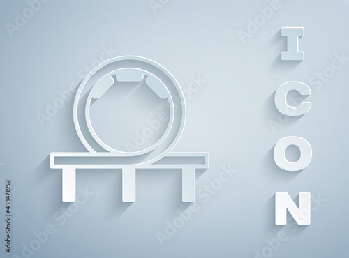 Paper cut Roller coaster icon isolated on grey background. Amusement park. Childrens entertainment playground, recreation park. Paper art style. Vector