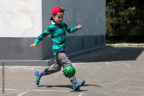 Kid playing street football