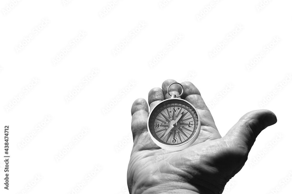 round compass in hand isolated on white background for abstract image with place for text as symbol of tourism with compass, travel with compass and outdoor activities with compass round compass in hand isolated on white background for abstract image with place for text as symbol of tourism with compass, travel with compass and outdoor activities with compass
