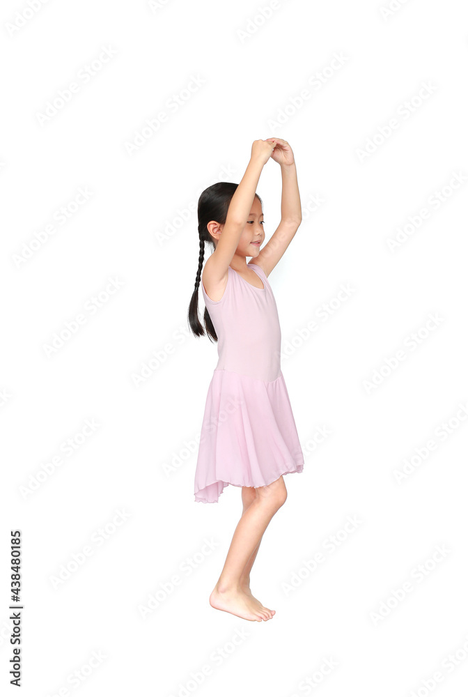 Little child girl dreams of becoming a ballerina. Beautiful little Asian children in pink tutu skirt isolated on white background. Little child girl dreams of becoming a ballerina. Beautiful little Asian children in pink tutu skirt isolated on white background.