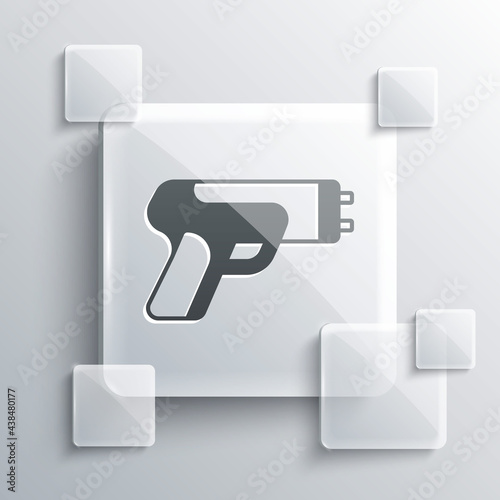 Grey Police electric shocker icon isolated on grey background. Shocker for protection. Taser is an electric weapon. Square glass panels. Vector