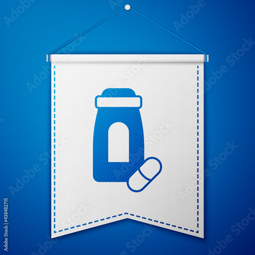Blue Sedative pills icon isolated on blue background. White pennant template. Vector