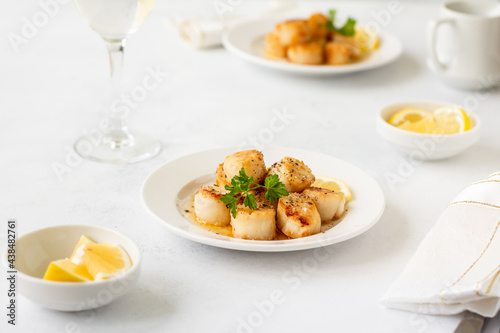 Fried scallops with butter lemon spicy sauce.