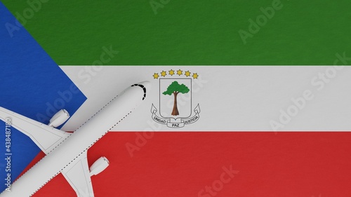 Top Down View of a Plane in the Corner on Top of the Country Flag of Equatorial Guinea