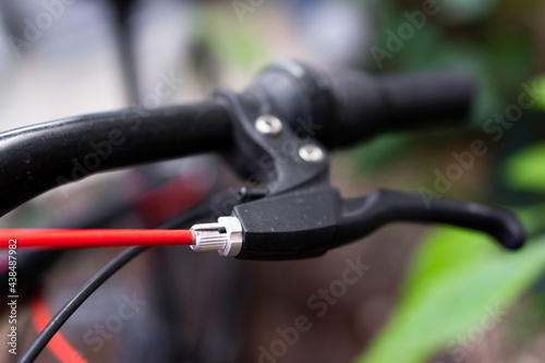 detail of bicycle brake lever, bicycle concept with selective focus