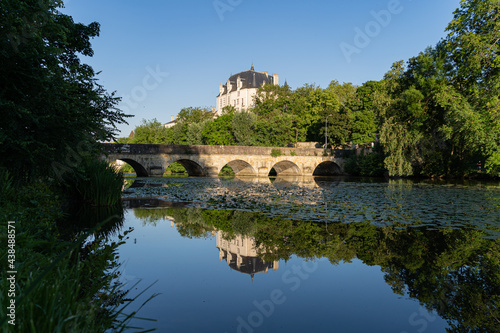 Castle Raoul and bridge with Reflection in Water, Chateauroux city, France photo