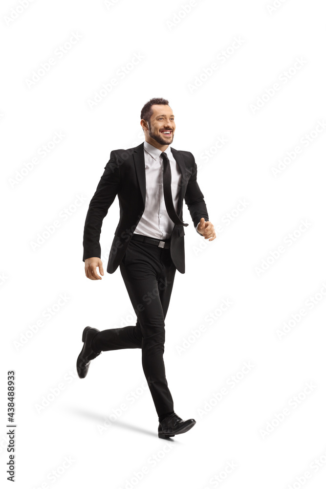 Full length shot of a happy businessman running and smiling Full length shot of a happy businessman running and smiling