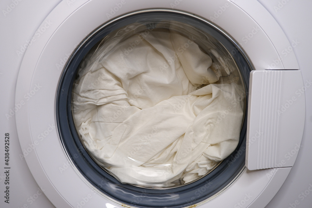 White linens in the washing machine.
