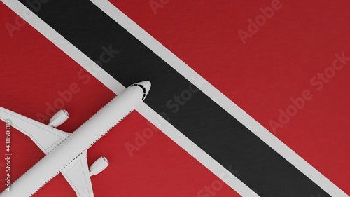 Top Down View of a Plane in the Corner on Top of the Country Flag of Trinidad and Tobago