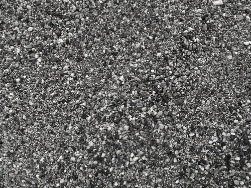 Background texture of small sea pebbles.  Gray sea pebbles, top view, copy space.