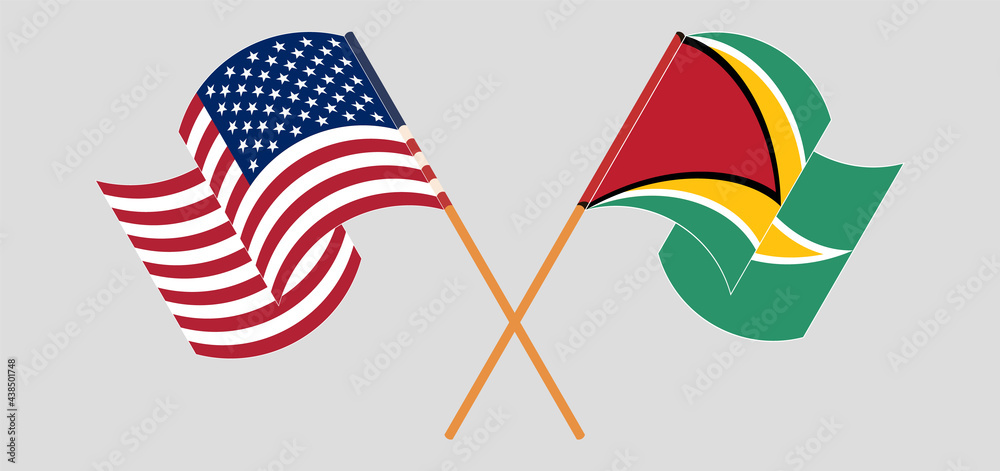 Crossed and waving flags of the USA and Guyana Crossed and waving flags of the USA and Guyana